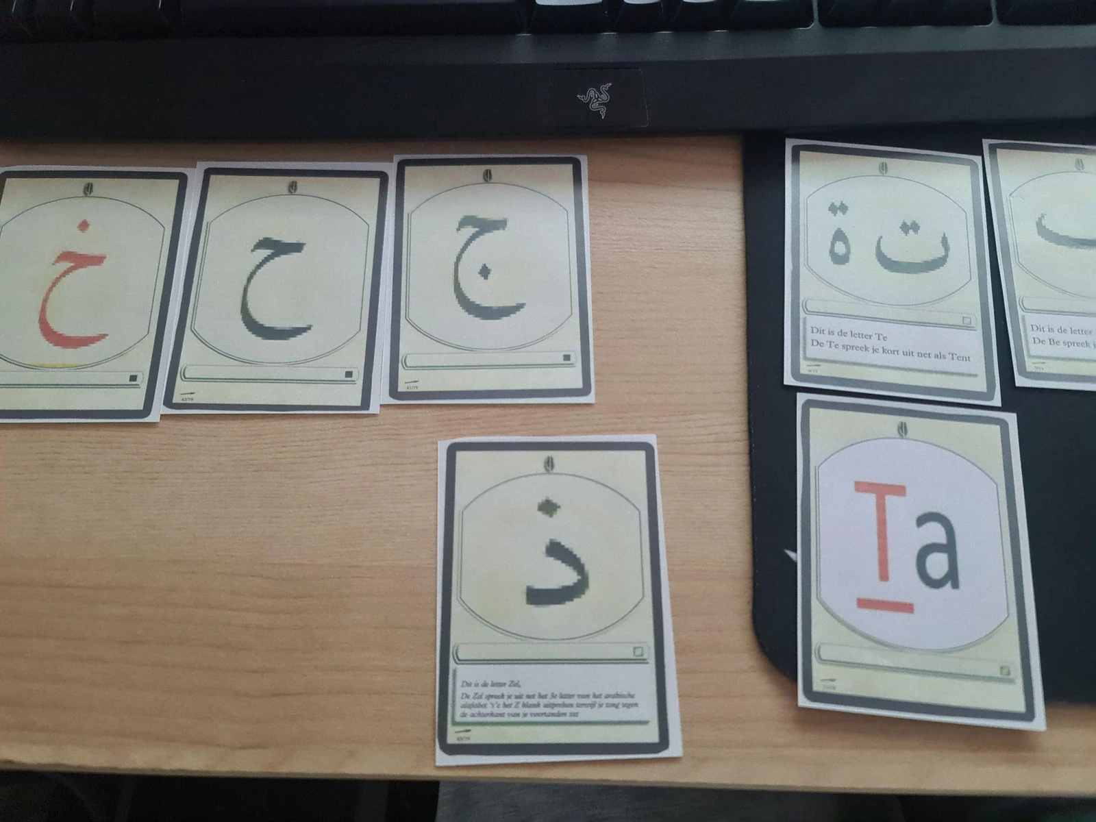 An early Elif Ba card prototype laid out on a desk